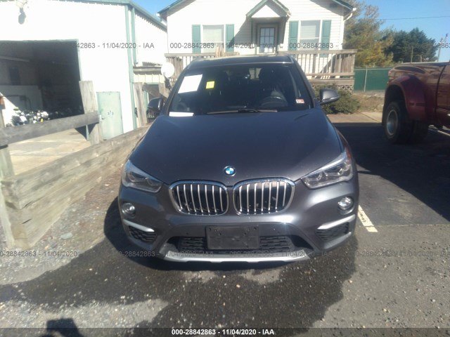 Photo 5 VIN: WBXHT3C34H5F81038 - BMW X1 