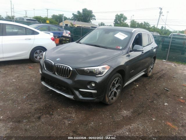 Photo 1 VIN: WBXHT3C34J5F90456 - BMW X1 