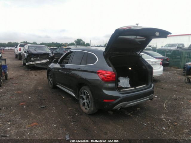 Photo 2 VIN: WBXHT3C34J5F90456 - BMW X1 