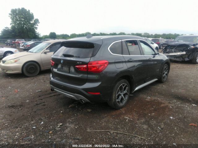 Photo 3 VIN: WBXHT3C34J5F90456 - BMW X1 