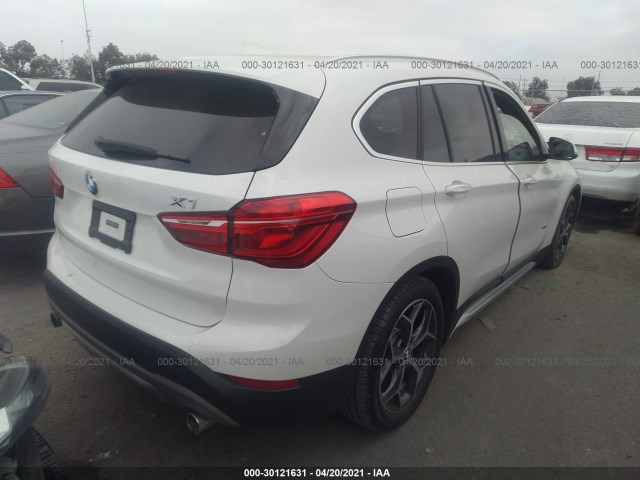 Photo 3 VIN: WBXHT3C34J5F91607 - BMW X1 