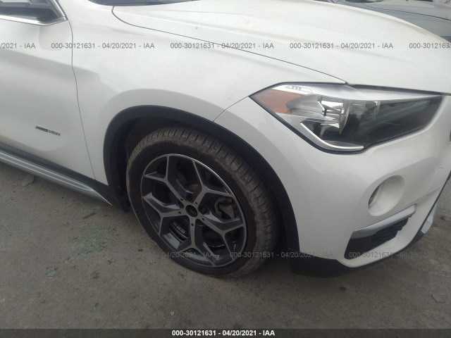 Photo 5 VIN: WBXHT3C34J5F91607 - BMW X1 