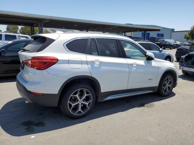 Photo 2 VIN: WBXHT3C34J5K24347 - BMW X1 