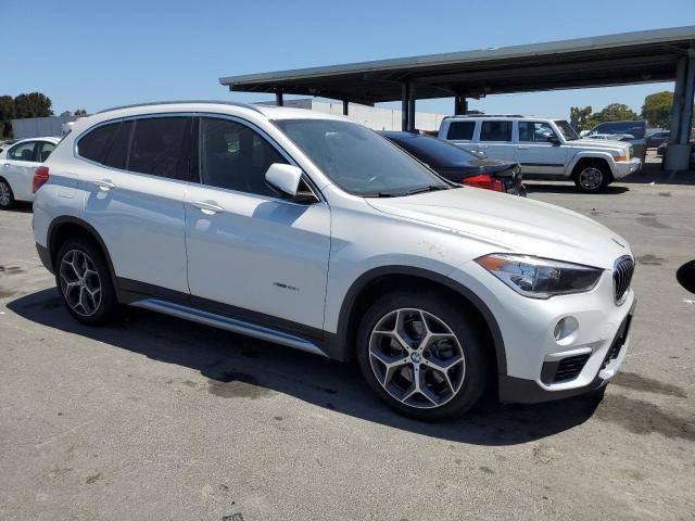 Photo 3 VIN: WBXHT3C34J5K24347 - BMW X1 