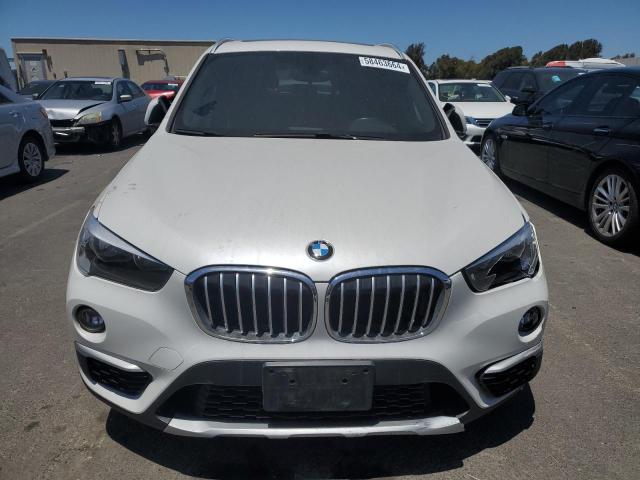 Photo 4 VIN: WBXHT3C34J5K24347 - BMW X1 