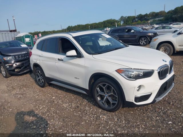 Photo 0 VIN: WBXHT3C34J5K29273 - BMW X1 