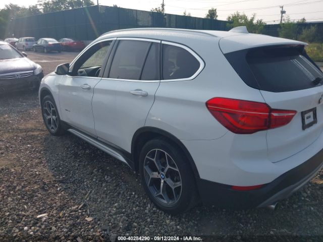 Photo 2 VIN: WBXHT3C34J5K29273 - BMW X1 