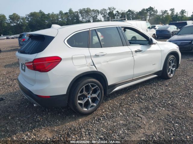 Photo 3 VIN: WBXHT3C34J5K29273 - BMW X1 