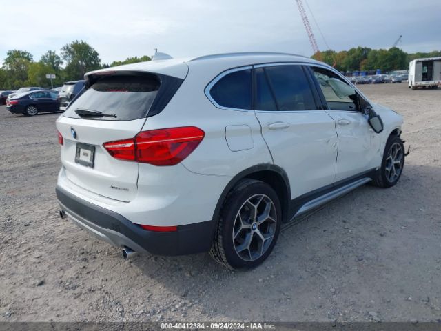 Photo 3 VIN: WBXHT3C34J5L28952 - BMW X1 