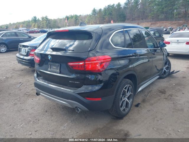 Photo 3 VIN: WBXHT3C34J5L29874 - BMW X1 