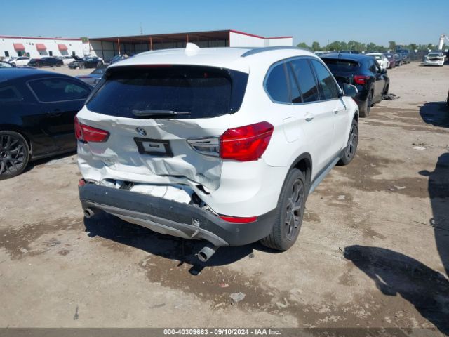 Photo 3 VIN: WBXHT3C34J5L31060 - BMW X1 