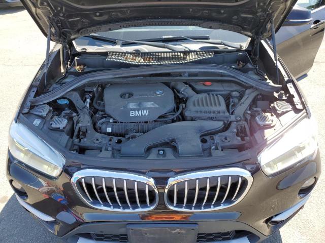 Photo 11 VIN: WBXHT3C35G5E48142 - BMW X1 