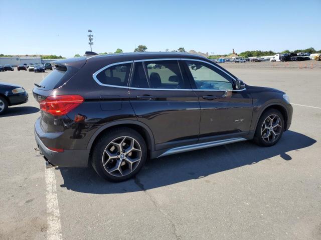 Photo 2 VIN: WBXHT3C35G5E48142 - BMW X1 