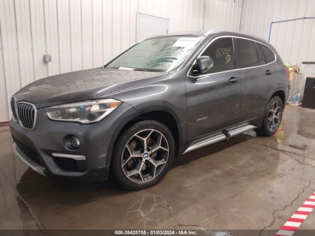 Photo 1 VIN: WBXHT3C35G5E48237 - BMW X1 