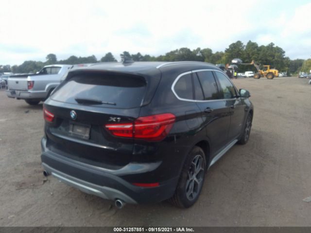 Photo 3 VIN: WBXHT3C35G5E50974 - BMW X1 