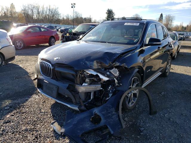 Photo 1 VIN: WBXHT3C35G5E54930 - BMW X1 