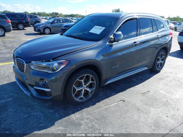 Photo 1 VIN: WBXHT3C35G5E55785 - BMW X1 