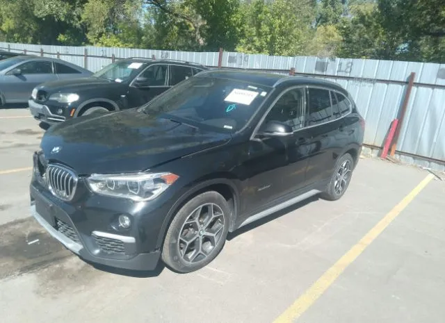 Photo 1 VIN: WBXHT3C35G5F66692 - BMW X1 