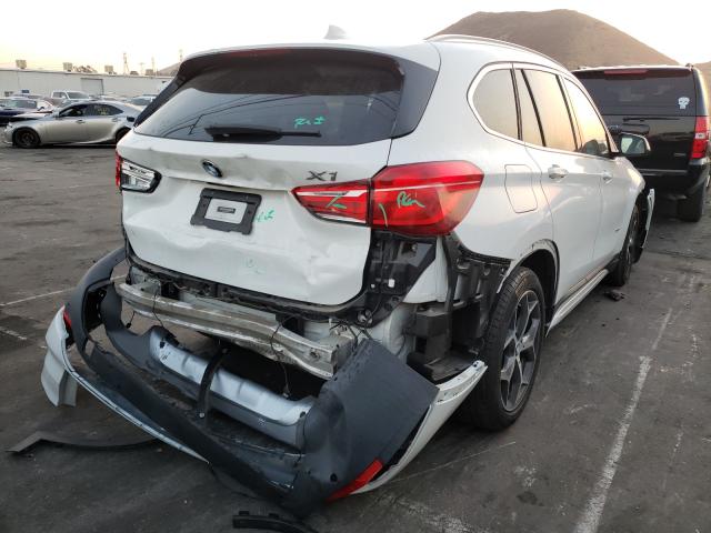 Photo 3 VIN: WBXHT3C35GP884409 - BMW X1 