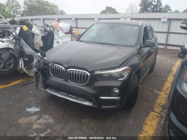 Photo 1 VIN: WBXHT3C35GP884684 - BMW X1 