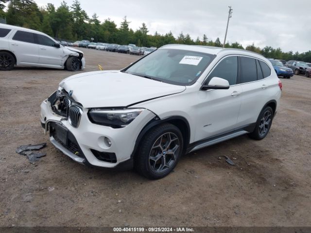 Photo 1 VIN: WBXHT3C35GP887715 - BMW X1 