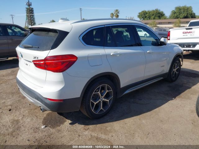 Photo 3 VIN: WBXHT3C35H5F68623 - BMW X1 