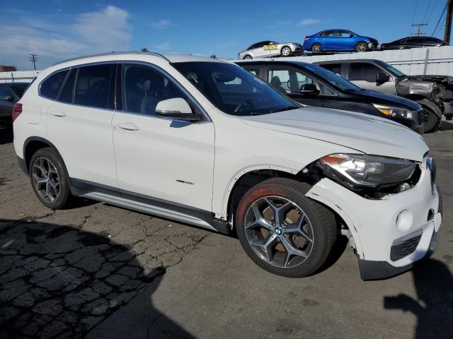 Photo 3 VIN: WBXHT3C35H5F68766 - BMW X1 