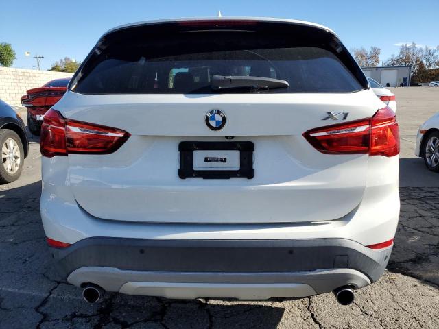 Photo 5 VIN: WBXHT3C35H5F68766 - BMW X1 