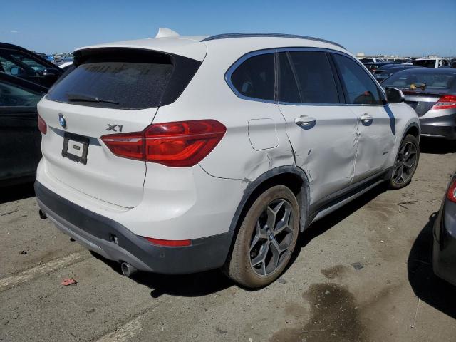 Photo 2 VIN: WBXHT3C35H5F69142 - BMW X1 