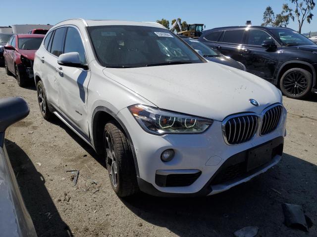 Photo 3 VIN: WBXHT3C35H5F69142 - BMW X1 