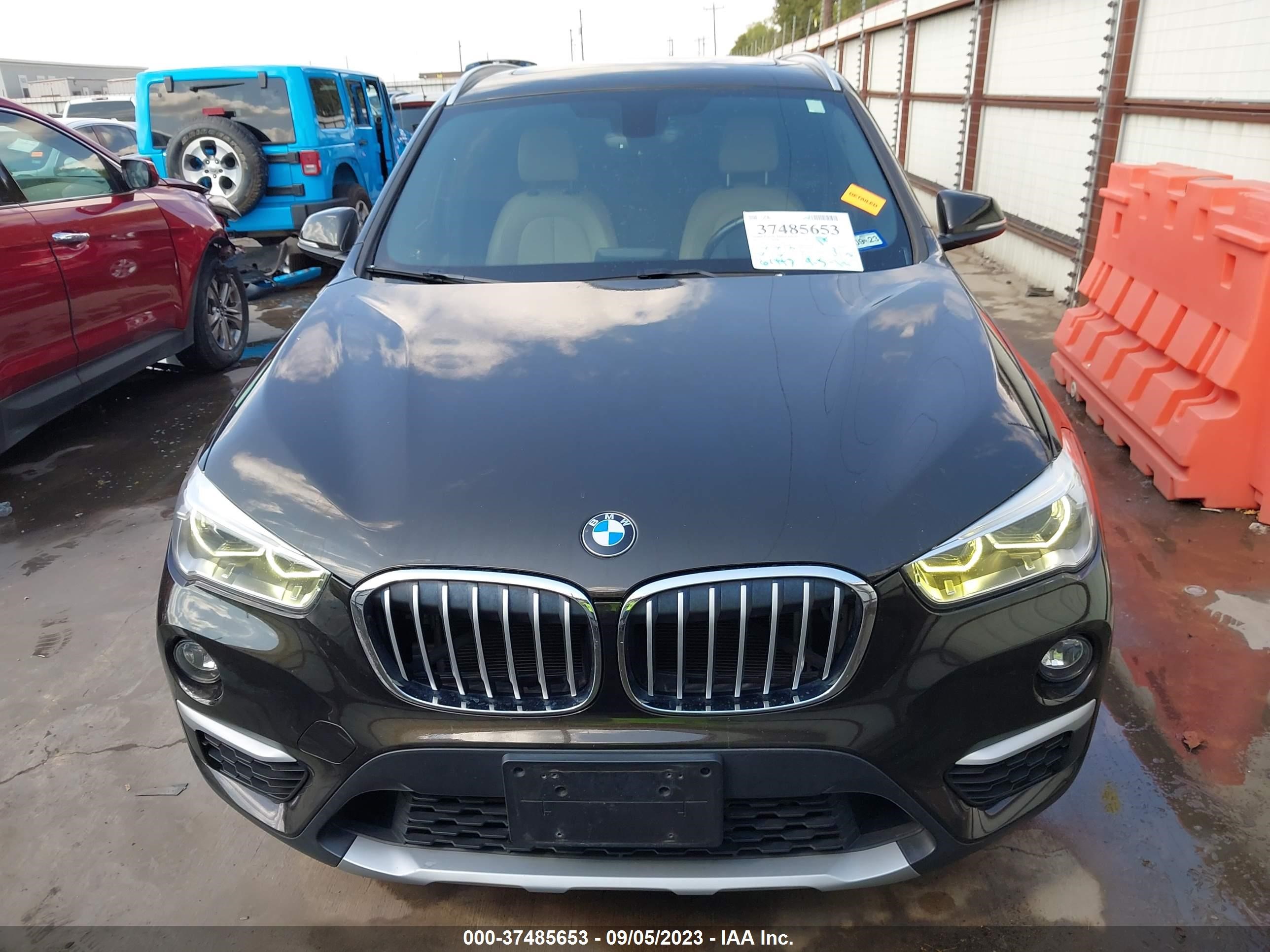 Photo 12 VIN: WBXHT3C35H5F71683 - BMW X1 