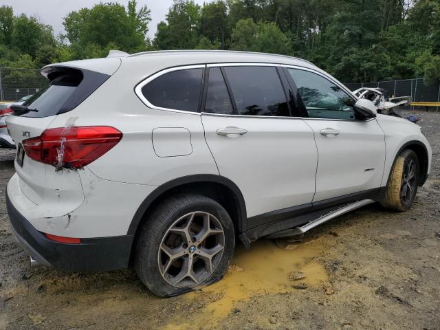 Photo 2 VIN: WBXHT3C35H5F76625 - BMW X1 XDRIVE2 