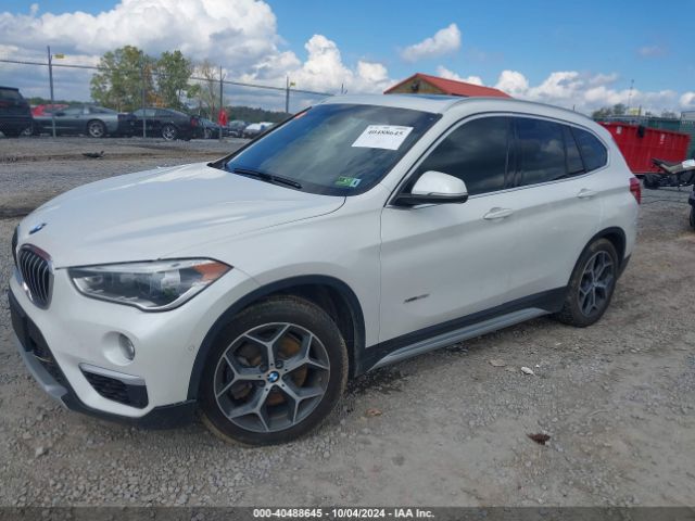 Photo 1 VIN: WBXHT3C35H5F78875 - BMW X1 