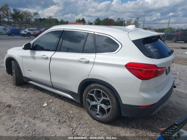 Photo 2 VIN: WBXHT3C35H5F78875 - BMW X1 