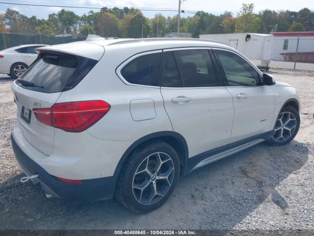 Photo 3 VIN: WBXHT3C35H5F78875 - BMW X1 