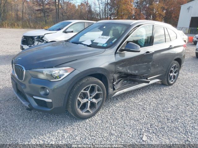 Photo 1 VIN: WBXHT3C35H5F79749 - BMW X1 