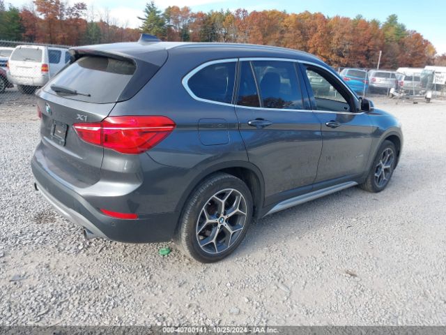 Photo 3 VIN: WBXHT3C35H5F79749 - BMW X1 