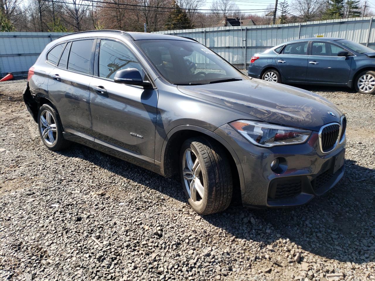 Photo 3 VIN: WBXHT3C35H5F81579 - BMW X1 