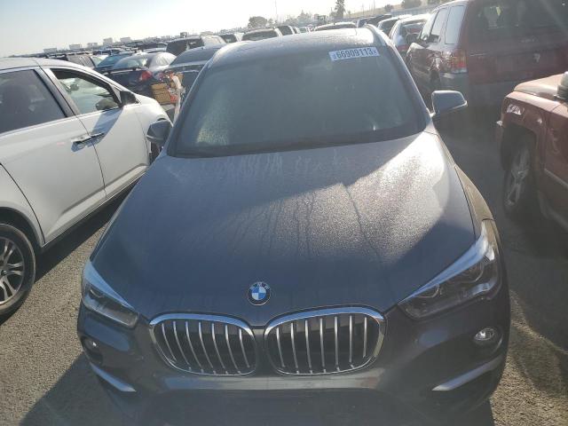 Photo 4 VIN: WBXHT3C35H5F86068 - BMW X1 