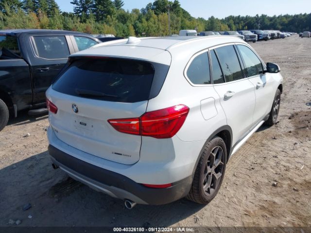 Photo 3 VIN: WBXHT3C35J3F03949 - BMW X1 