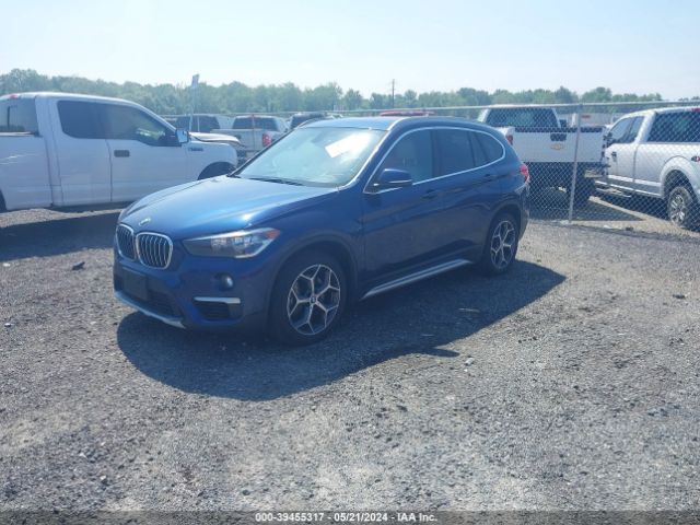 Photo 1 VIN: WBXHT3C35J3H30588 - BMW X1 