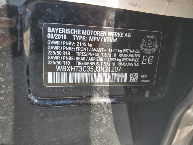 Photo 12 VIN: WBXHT3C35J3H31207 - BMW X1 