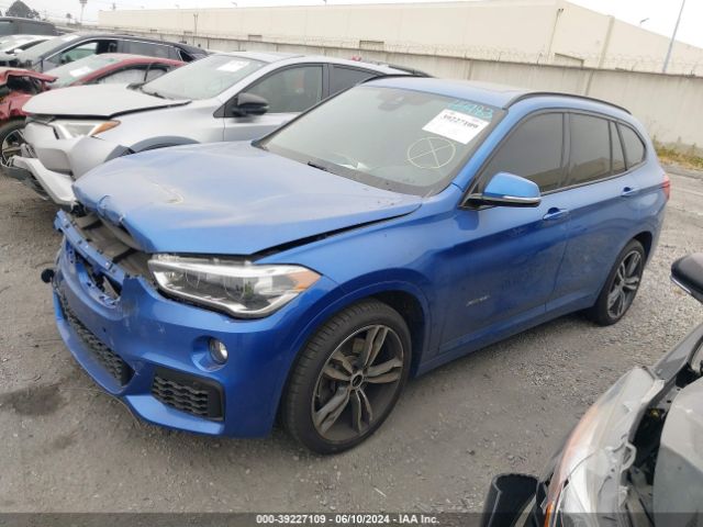 Photo 1 VIN: WBXHT3C35J5F89607 - BMW X1 