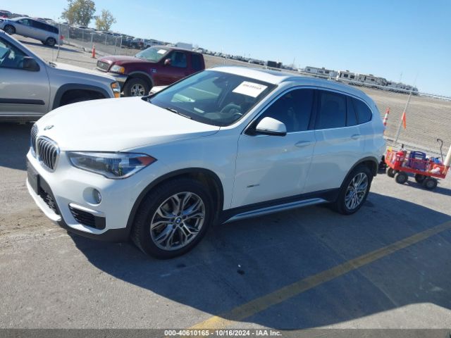 Photo 1 VIN: WBXHT3C35J5K22140 - BMW X1 