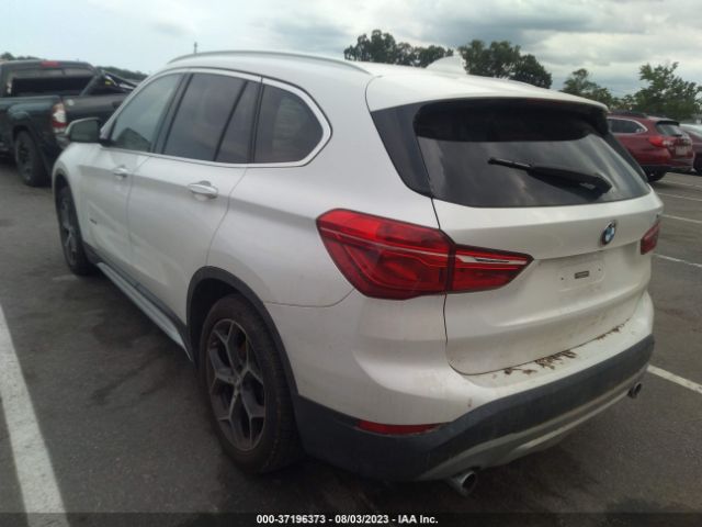 Photo 2 VIN: WBXHT3C35J5K29492 - BMW X1 