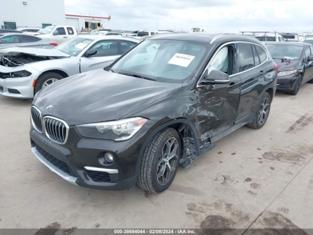 Photo 1 VIN: WBXHT3C35J5K31453 - BMW X1 