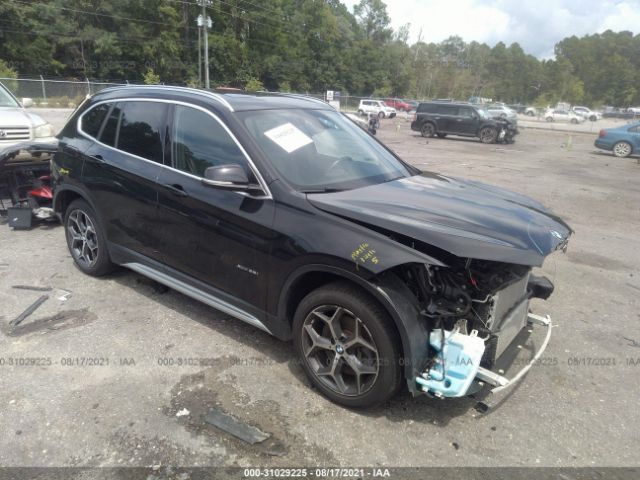 Photo 0 VIN: WBXHT3C35J5K31520 - BMW X1 