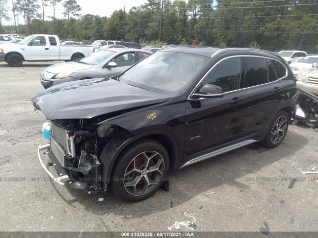 Photo 1 VIN: WBXHT3C35J5K31520 - BMW X1 