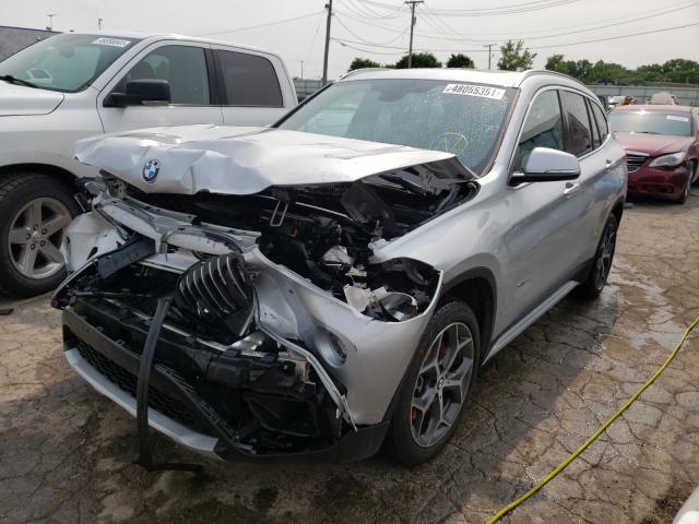 Photo 1 VIN: WBXHT3C35J5L24943 - BMW X1 