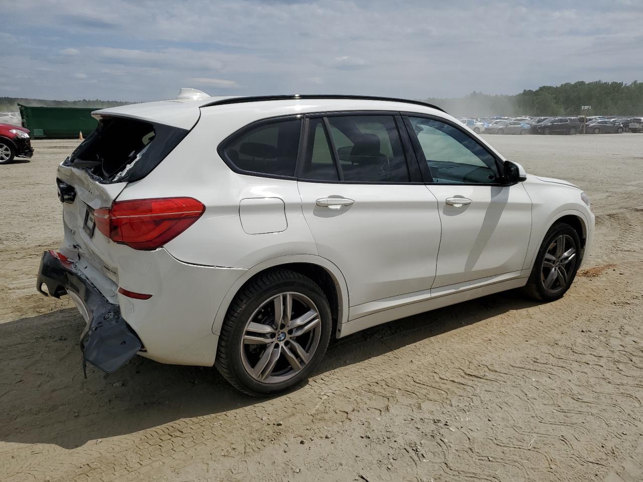 Photo 2 VIN: WBXHT3C35J5L34730 - BMW X1 